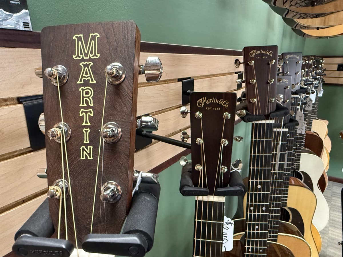 Martin acoustic guitars on the wall at Flatland Guitar